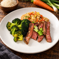 Teriyaki Steak Fried Rice with ingredients in the background